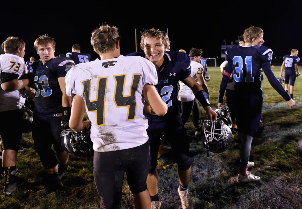 Tolton sophomore Ben Breitwiser hugs Cuba High School freshman Zack Minardi